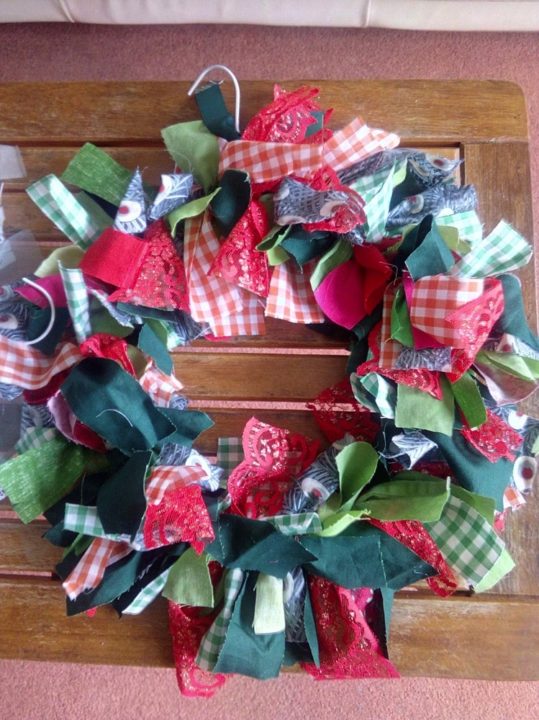 Wreath, made from a hanger and strips of material